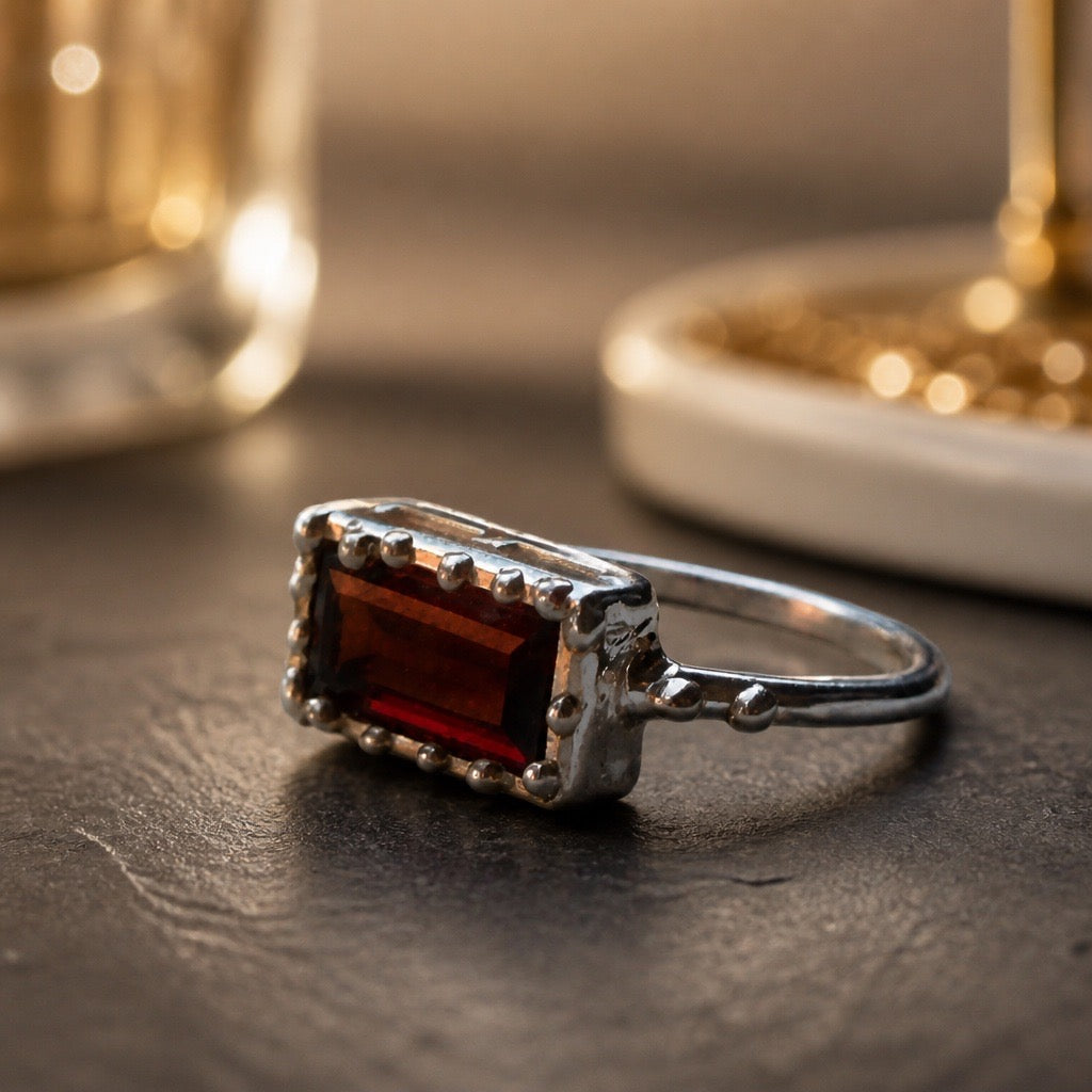 Garnet East / West Sterling Silver, White Gold and Gold Plated Ring